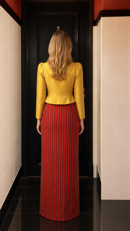 Back view of yellow peplum jacket and maxi skirt outfit