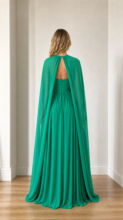 Back view of emerald green evening dress showing cape and closure