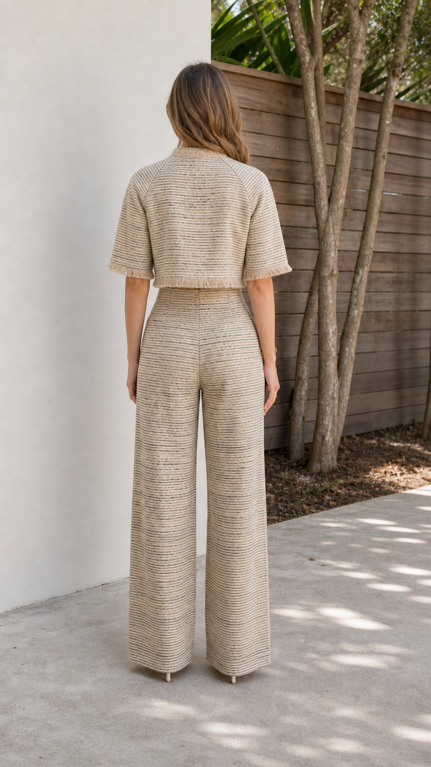 Back view of beige tweed set showing wide-leg trousers