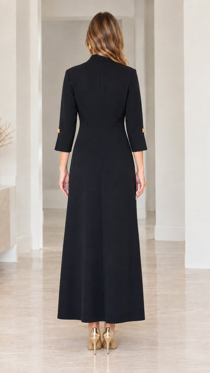 Back full-length view of woman modeling black A-line maxi dress