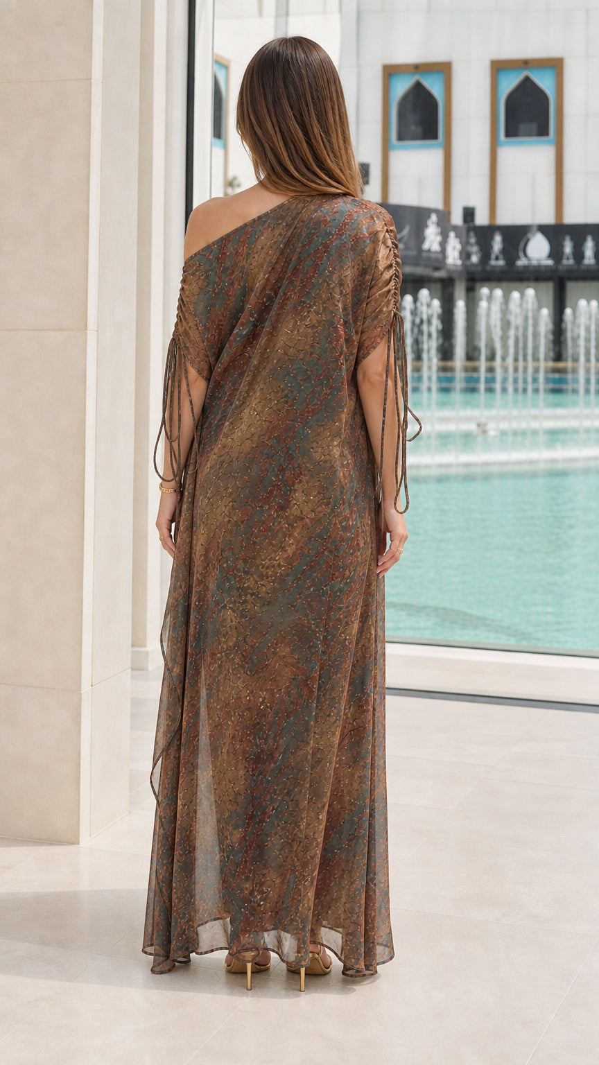 Back view of Bronze Multi relaxed kaftan maxi dress by the pool