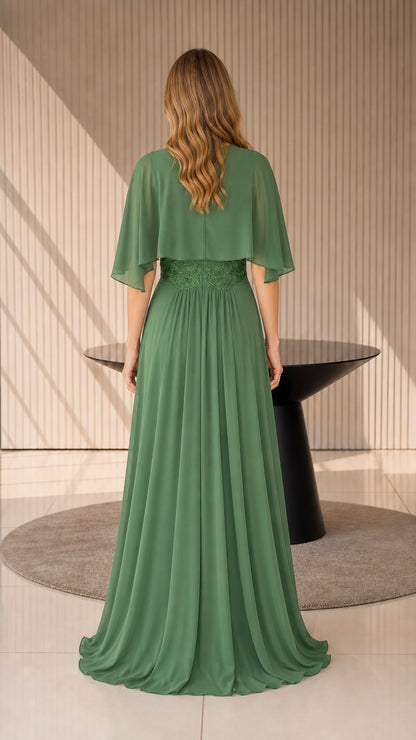 Back view of model showcasing draped cape sleeves on sage green gown