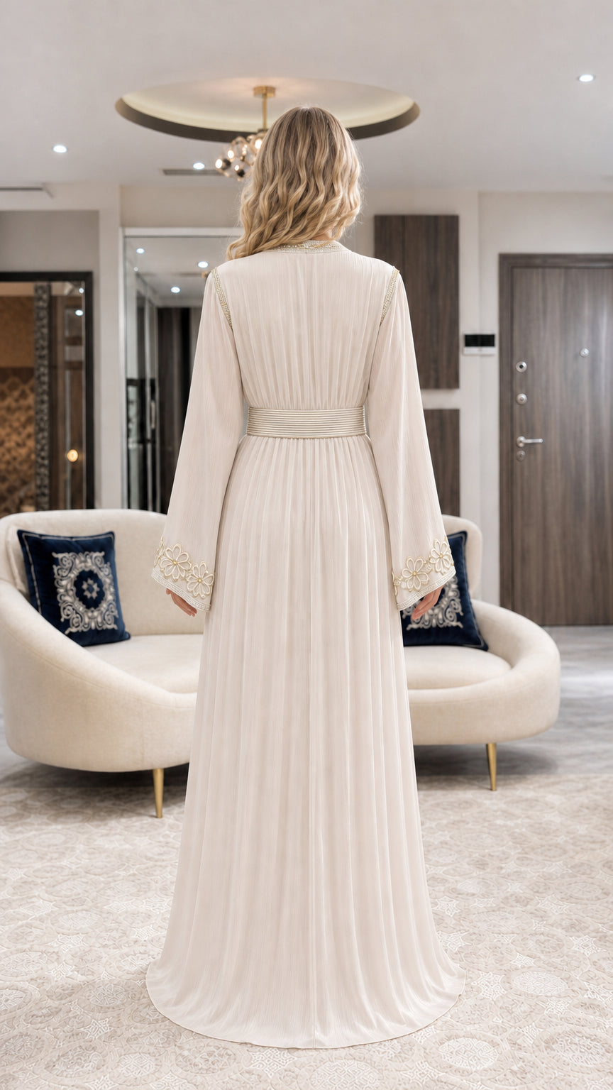 Back view of flowy champagne pleated maxi caftan dress