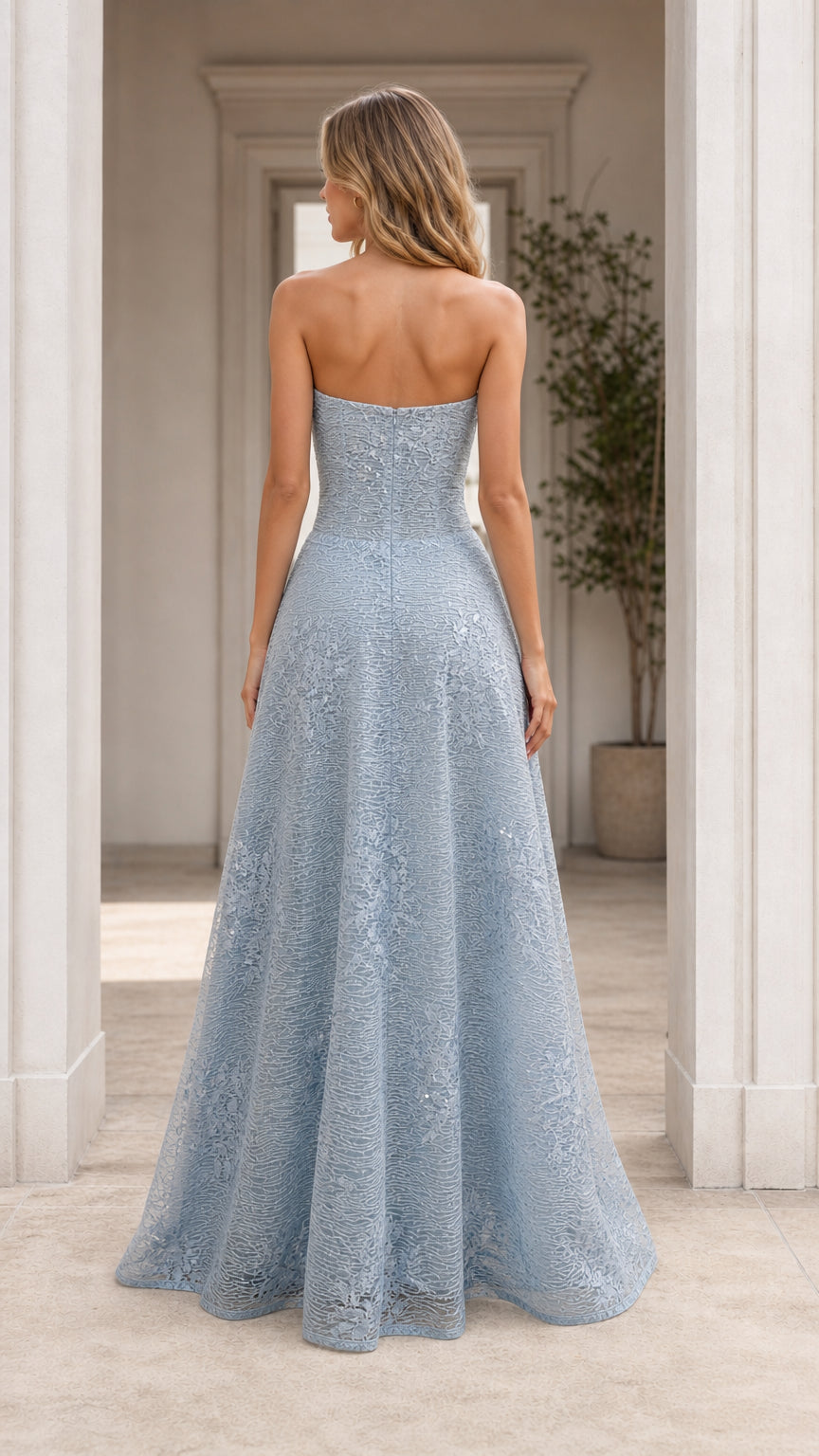 Back view of light blue strapless A-line evening dress