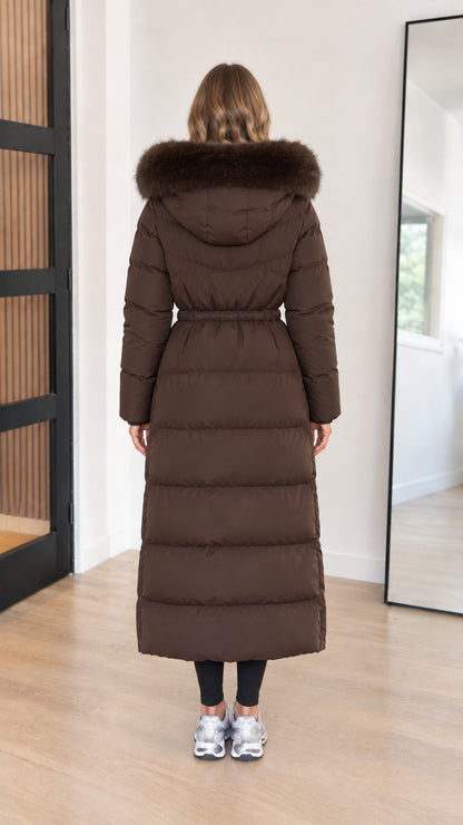 Back view of chocolate brown maxi puffer coat highlighting adjustable waist cinch
