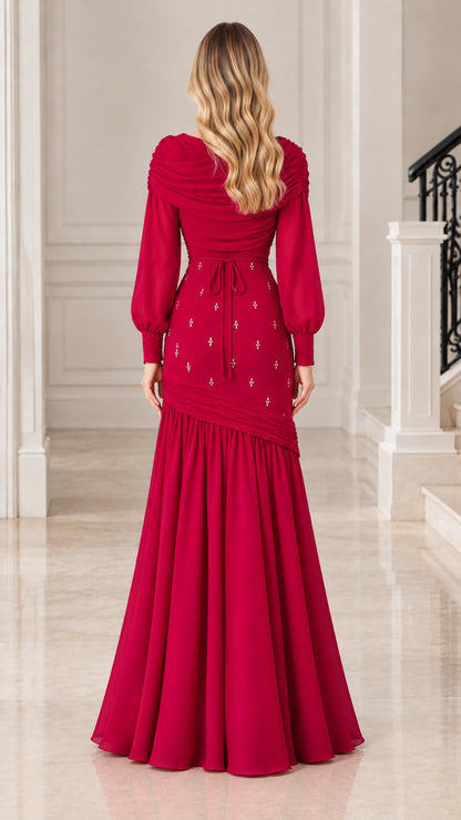 Back view of model wearing Raspberry long sleeve evening gown with back waist tie detail