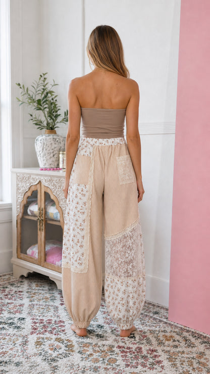 Back view of model wearing beige bohemian patchwork harem pants