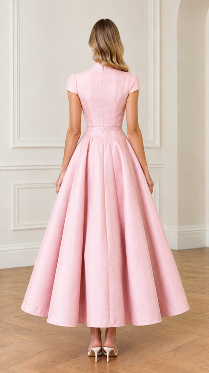 Back view of woman showing tailored back and zipper on Pink maxi dress