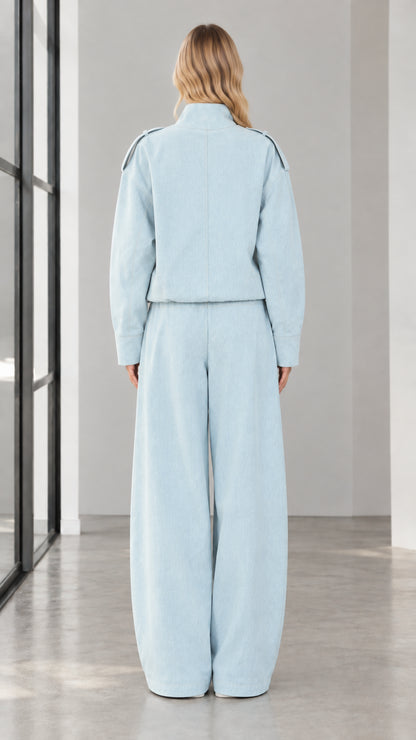 Back view of woman wearing Light Blue matching two piece pant set
