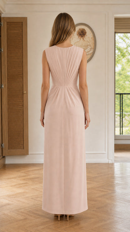 Back view of Blush Pink maxi dress highlighting radiating back pleats
