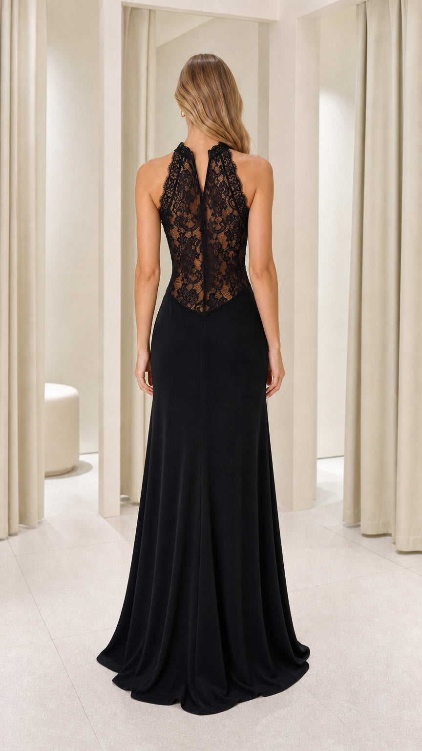 Back view showcasing sheer lace paneling on black gown