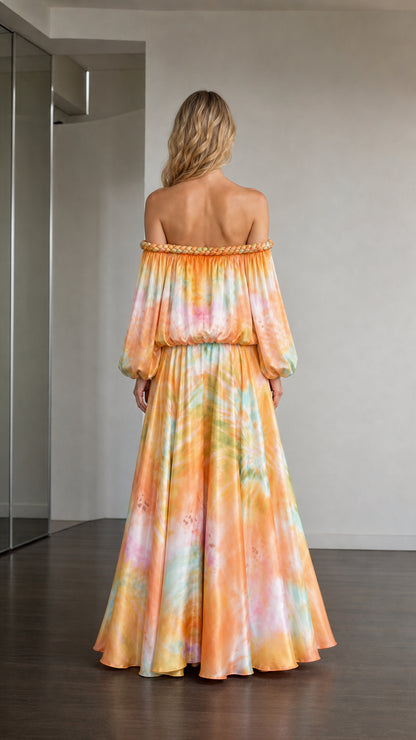 Back view of model in orange multi tie-dye maxi dress