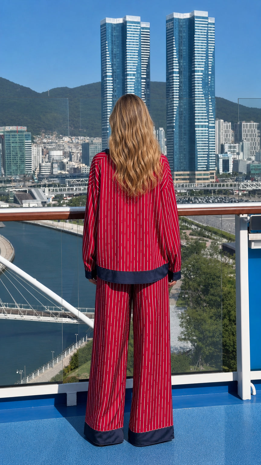 Back view of woman in red striped two piece set