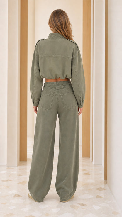 Back view of model wearing Sage Green matching cargo-style two-piece set