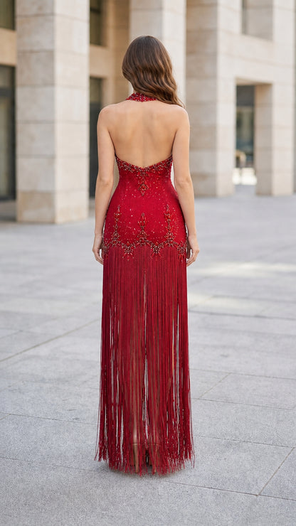 Back view showcasing halter neck and open back of Red gown