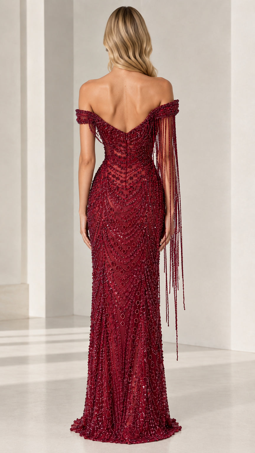 Back view of model in burgundy floor-length beaded column gown