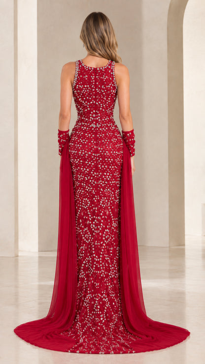 Red sparkling formal mermaid dress back view showing sweep train