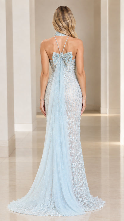Ice blue evening gown back view showing back bow and sheer train