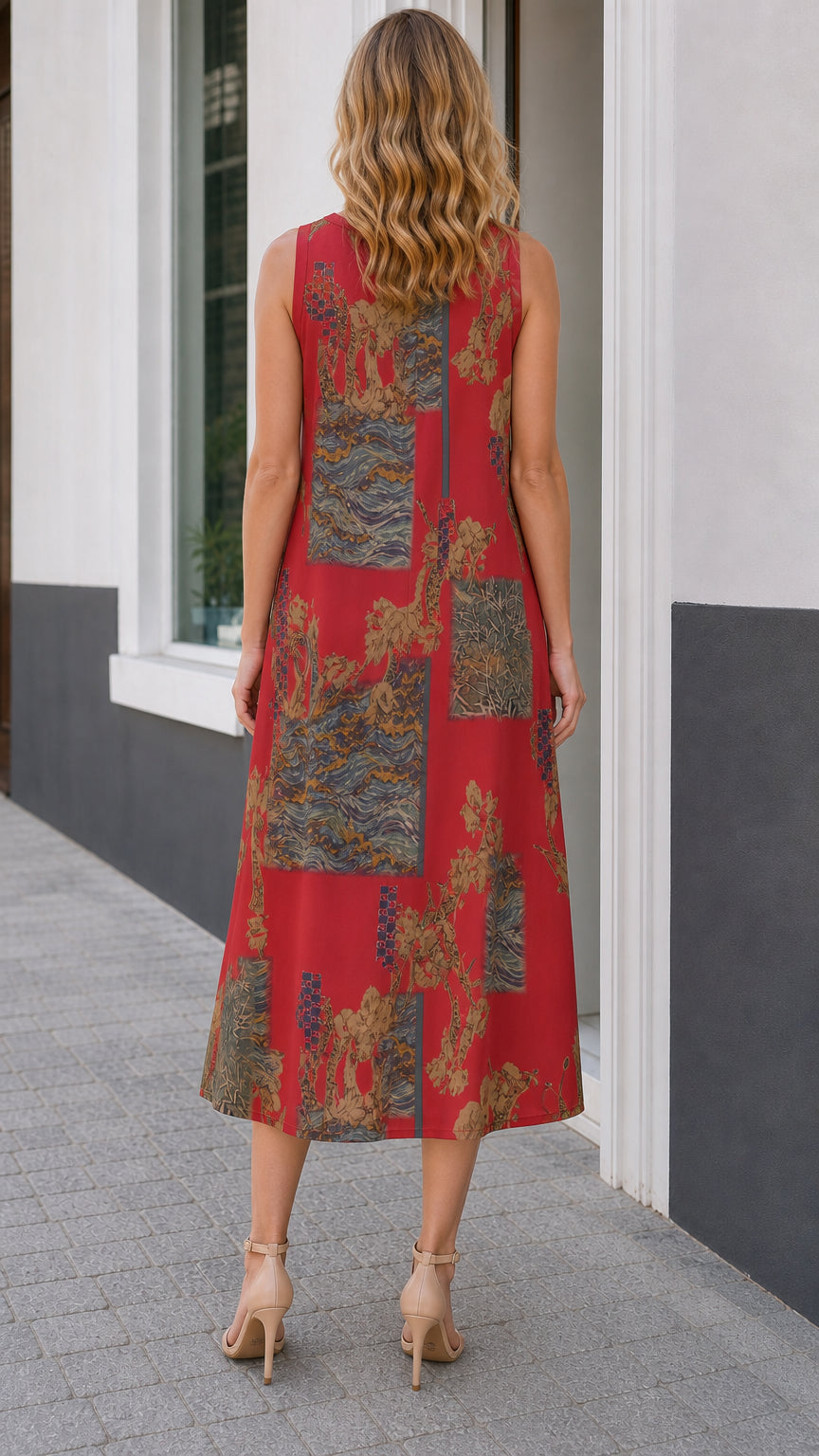Back view of red sleeveless artistic print midi dress showing relaxed fit