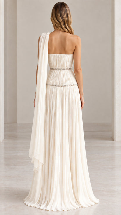Back view of ivory strapless evening gown showing attached cascading shoulder scarf
