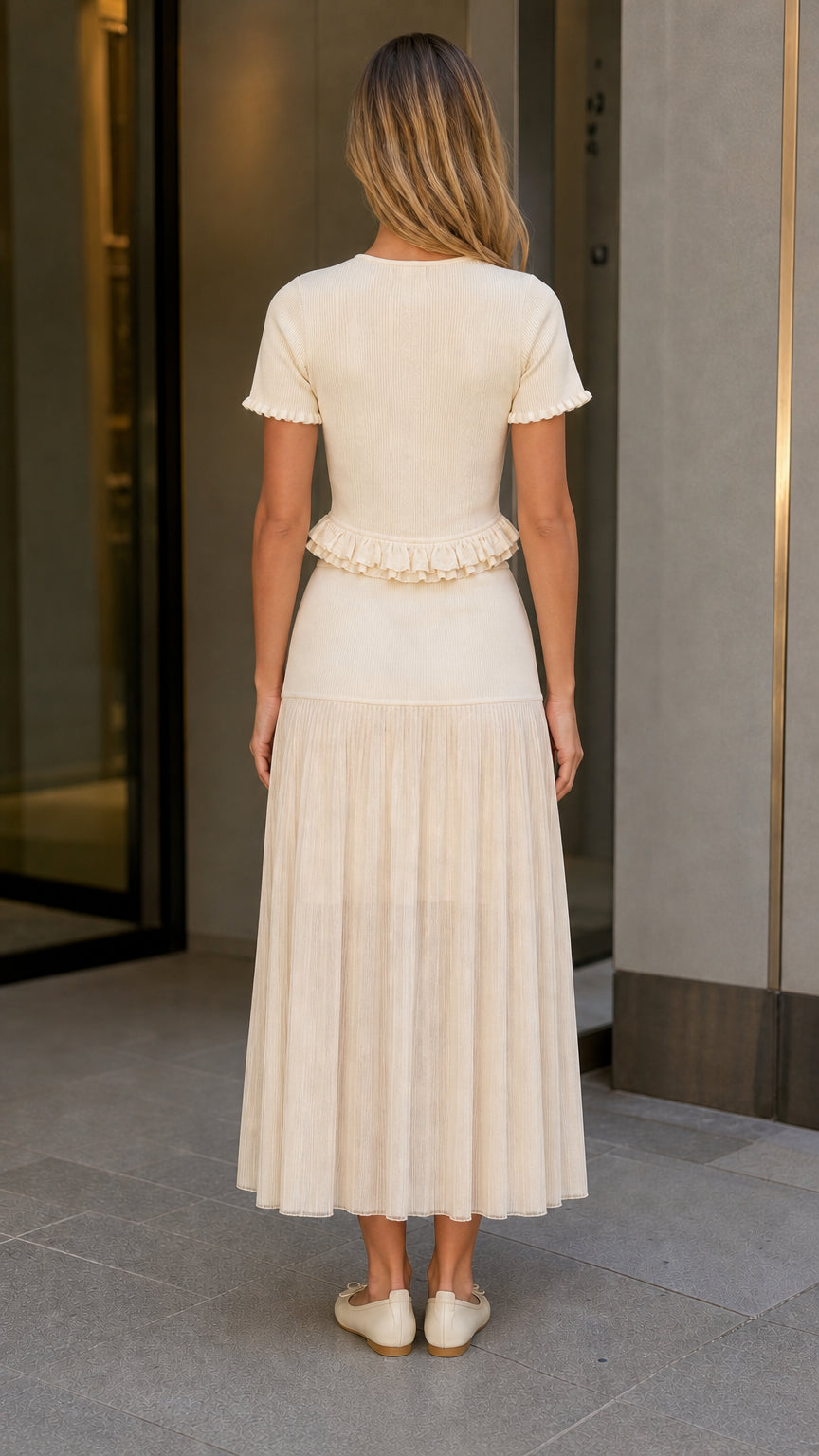 Back view of model wearing off white knit two-piece set
