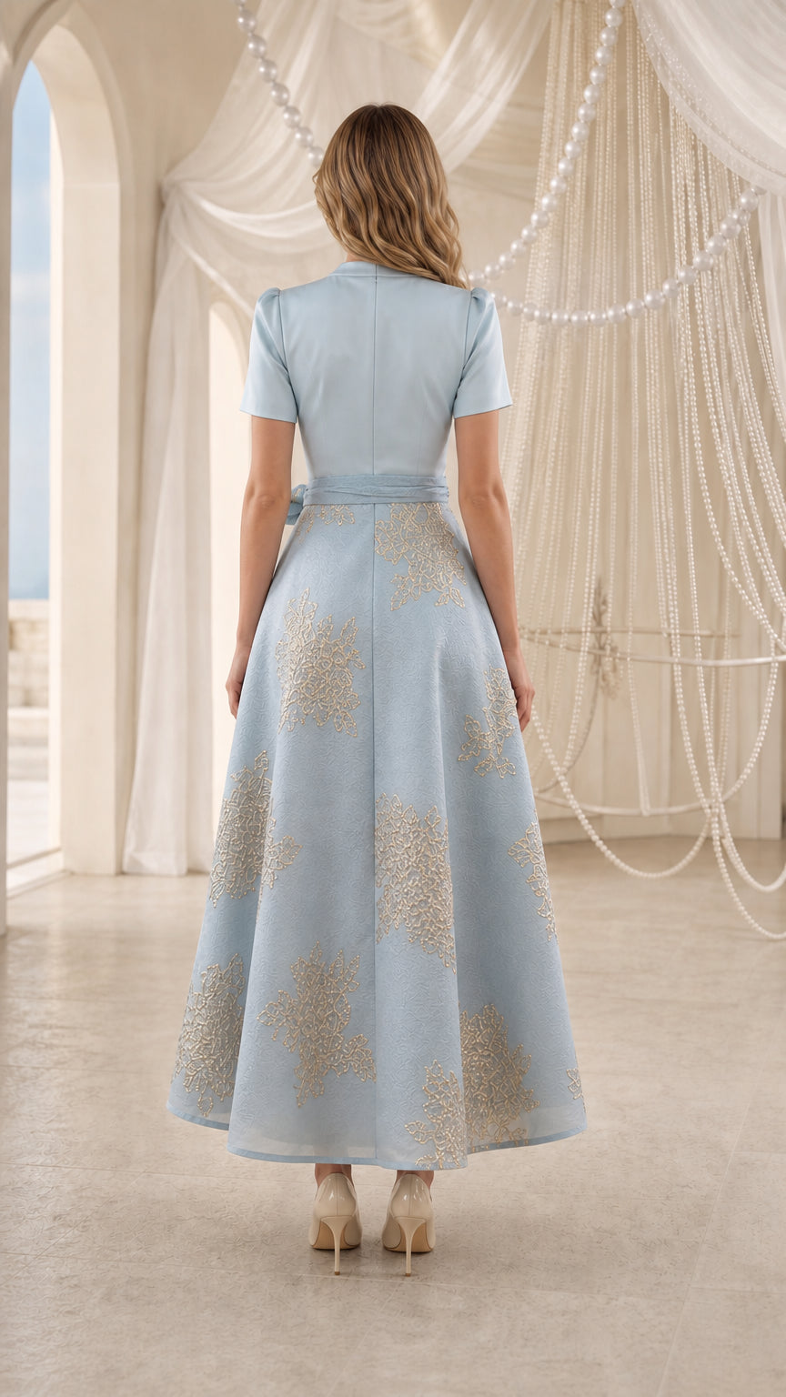 Back view of model wearing Light Blue floral jacquard wrap midi dress
