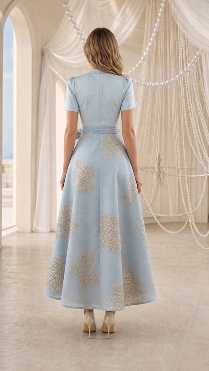 Back view of model wearing Light Blue floral jacquard wrap midi dress