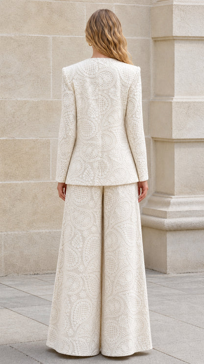 Back view of cream blazer and trousers