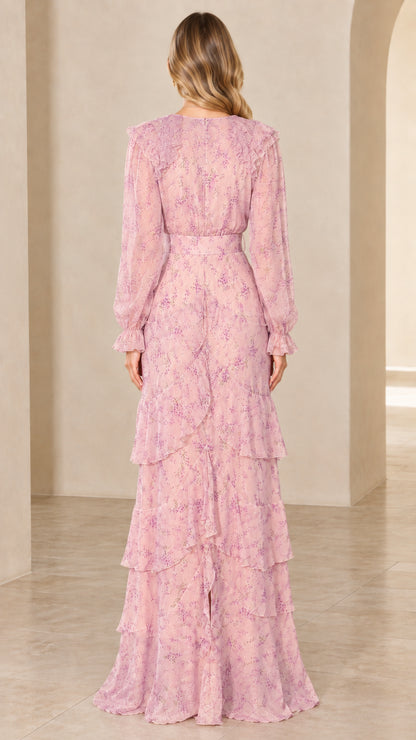 Back view of model in blush pink long sleeve floral maxi dress