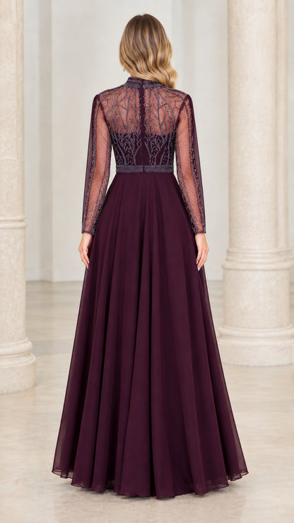 Back view of plum long sleeve formal gown showing illusion beaded back and concealed zipper