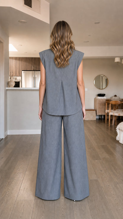 Back view of model wearing grey pinstripe matching set