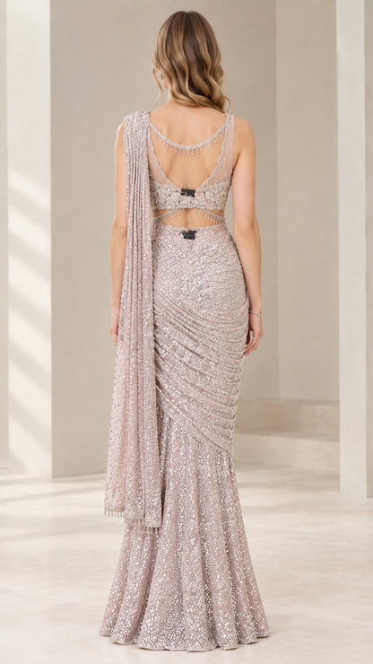 Back view of Dusty Mauve pre-draped saree gown highlighting back cutouts and beaded straps