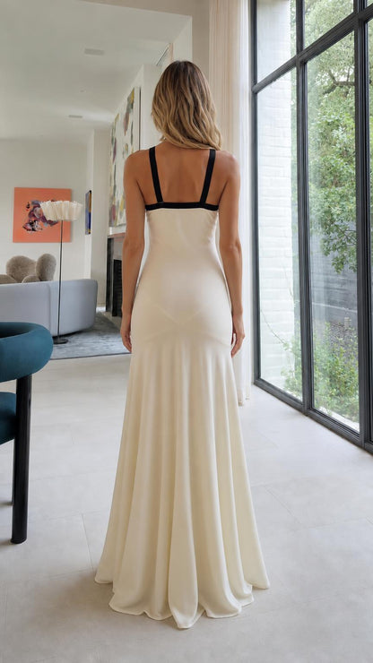 Back view of Ivory maxi dress showing open back