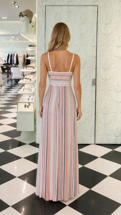 Back view of multi pink striped pleated maxi dress
