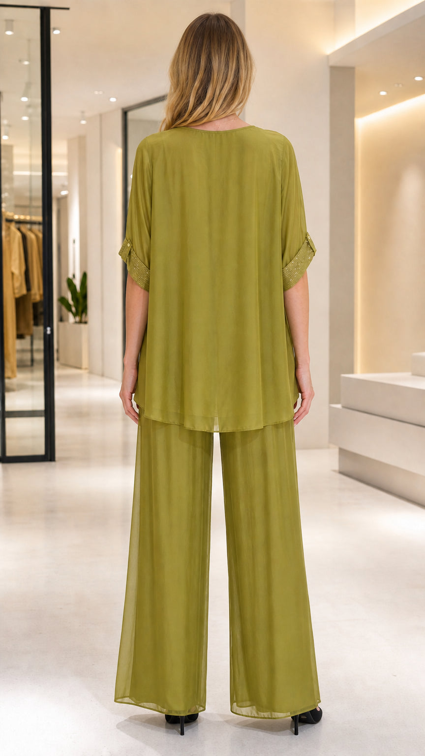 Back view of women's olive green flowing 2-piece formal set