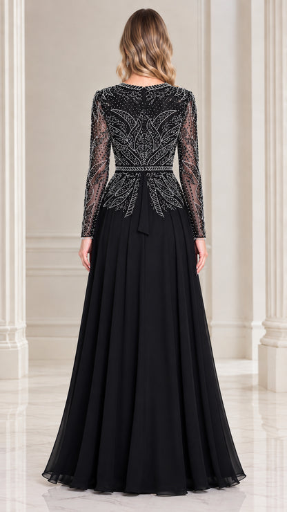 Back view of model wearing black beaded long sleeve evening dress