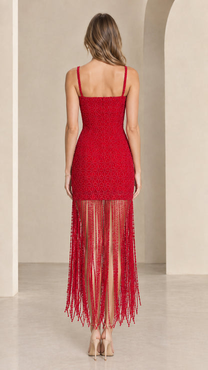 Back view of red beaded bodycon midi dress showing square back neckline and fringe skirt