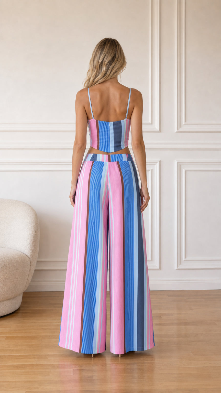 Back view of model wearing pink multi striped matching set