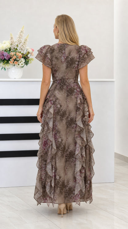 Back view of taupe floral ruffle maxi dress with layered skirt
