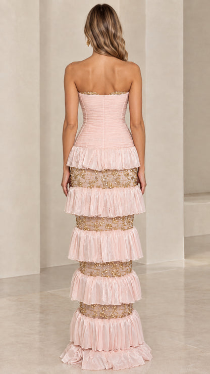 Back view of Blush Pink strapless column formal gown with layered ruffles