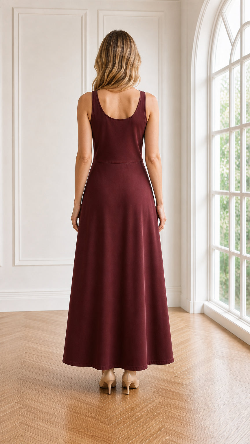 Back view of model wearing burgundy sleeveless scoop neck maxi dress