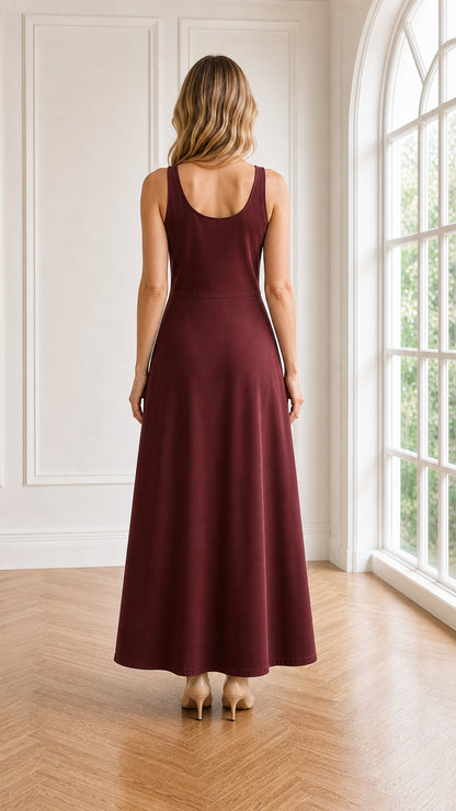 Back view of model wearing burgundy sleeveless scoop neck maxi dress