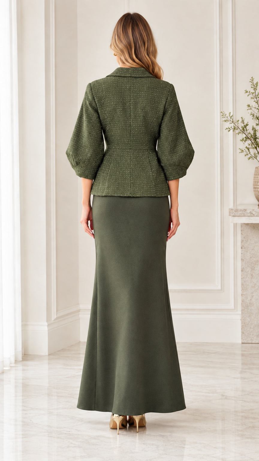 Back view of woman wearing olive green structured peplum suit set