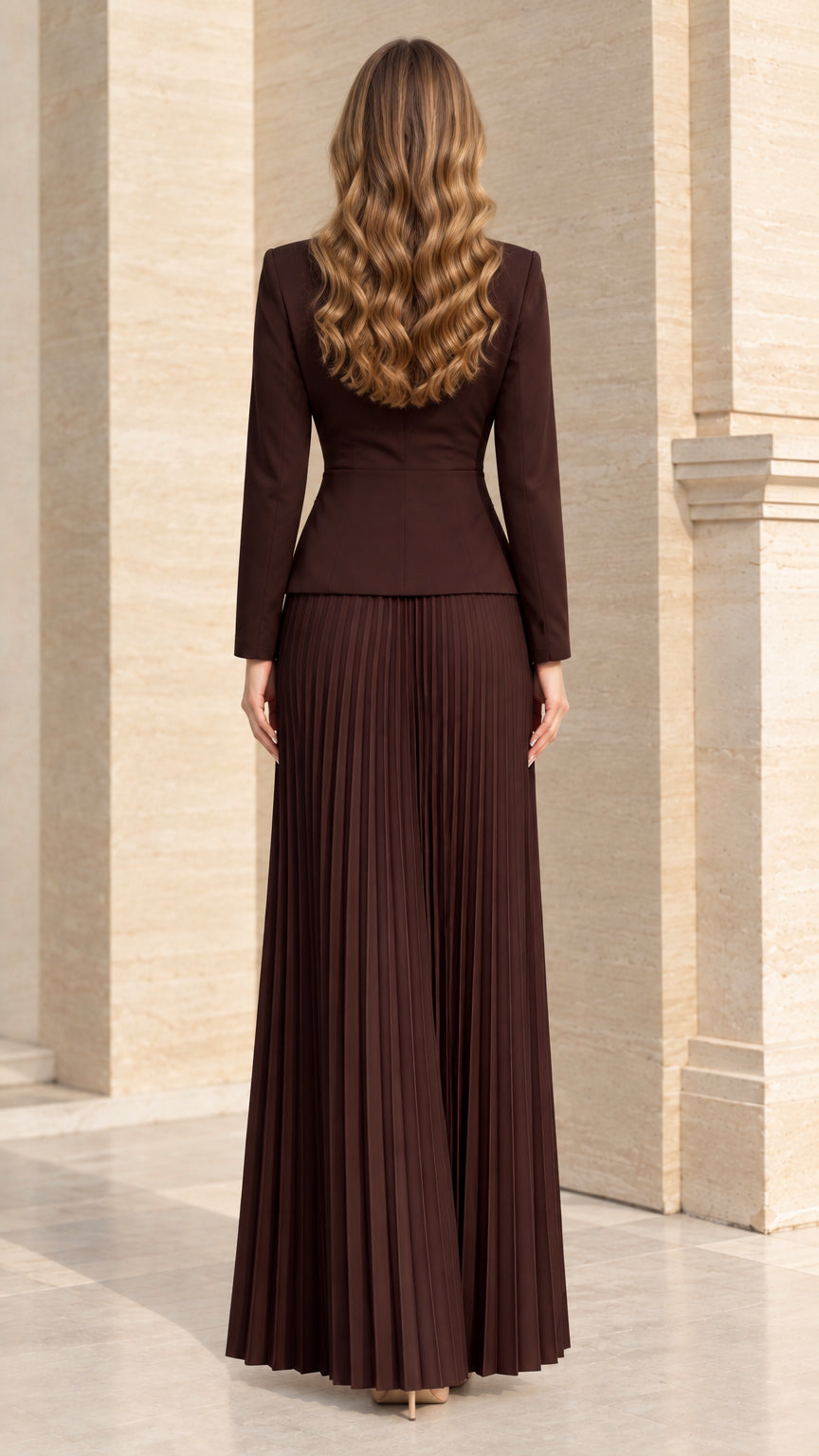 Back view of model in Chocolate Brown floor-length pleated blazer dress