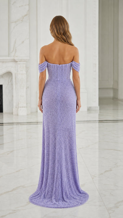 Back view of model in lavender beaded gown with sweep train