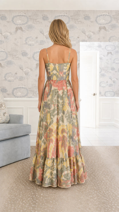Back view of model in Sage Multi spaghetti strap maxi dress with tiered hem