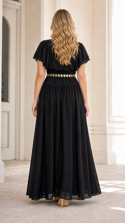 Back view of model in elegant black floor-length ruffle maxi dress