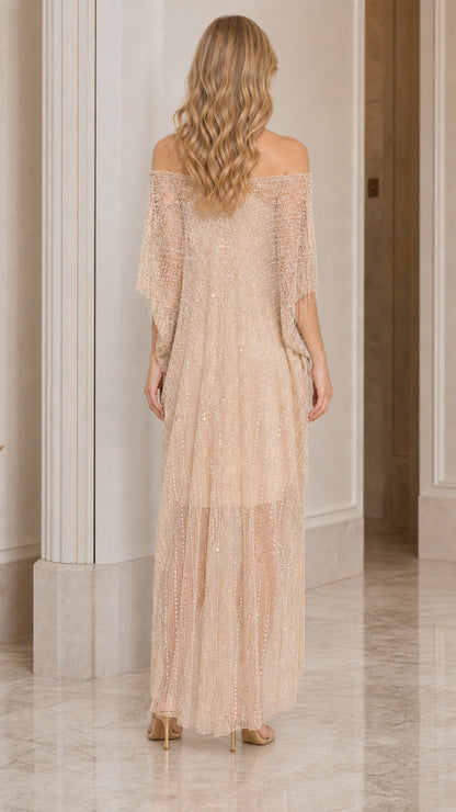 Back view of champagne draped off-the-shoulder evening maxi dress