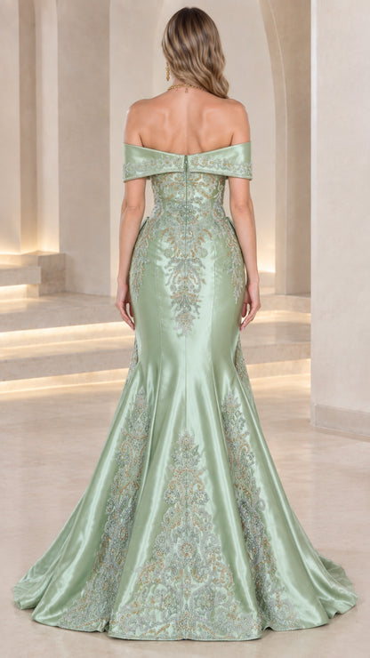 Back view of model showing fitted mermaid silhouette and train in sage green