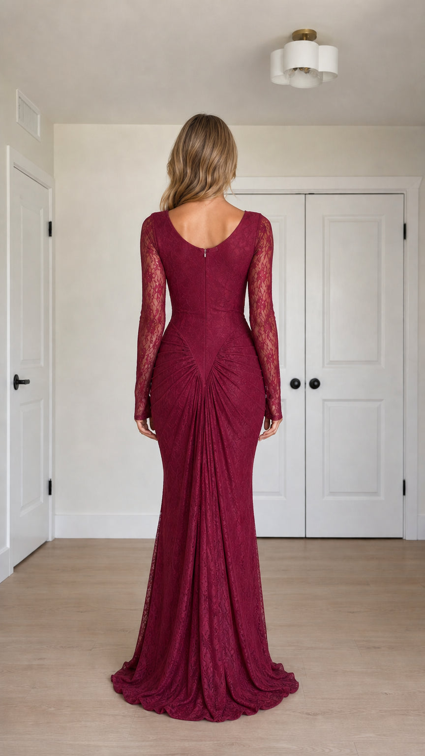 Back view of burgundy lace gown showing rear ruching and fitted silhouette